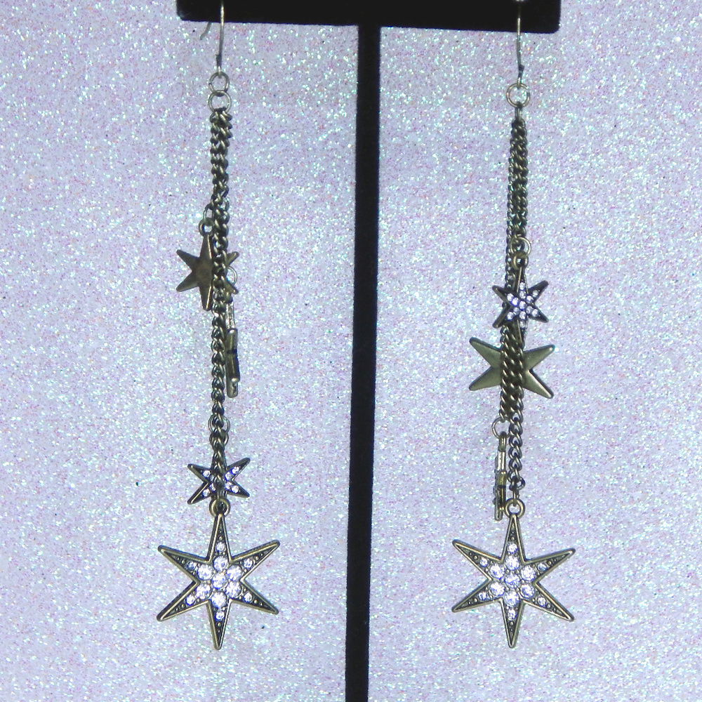 Gold star earring with rhinestone accent